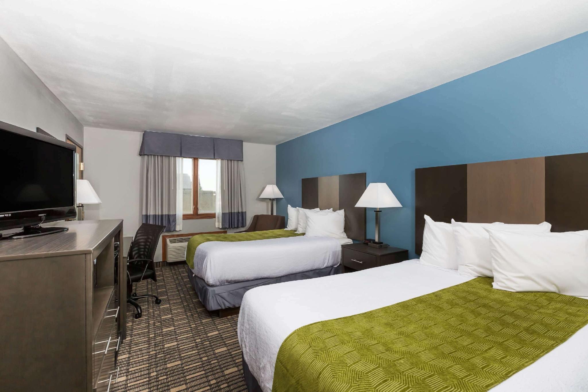 Baymont By Wyndham Pella Motel Exterior photo